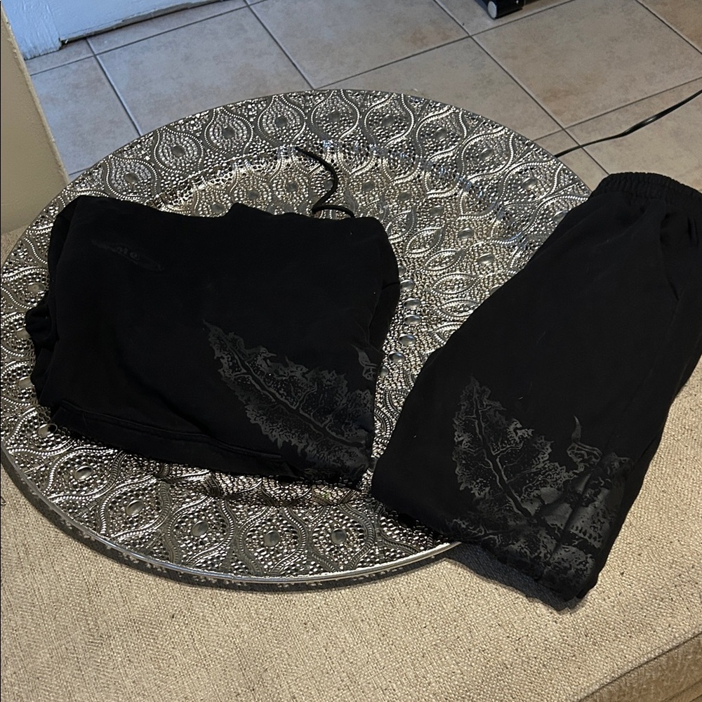Elegant Black Joggers with Leaf Design
